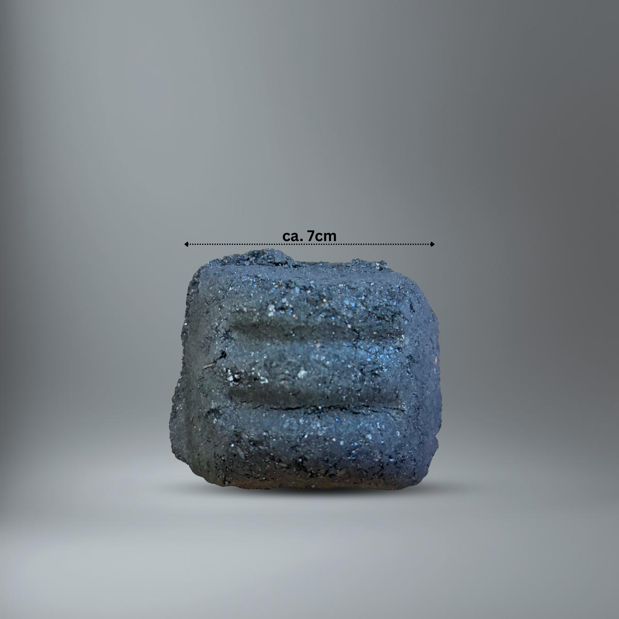 BlackSellig Beach Kokos Brikett von oben fotografiert mit dem Längenvermerk "ca. 7cm"